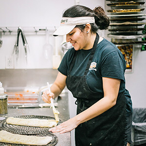 DoubleDave's team member preparing dough